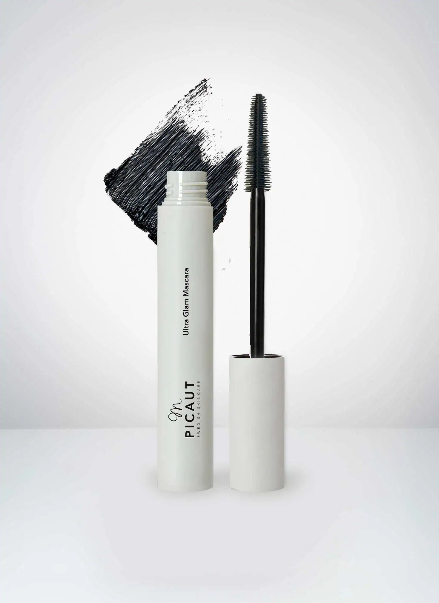 Ultra Glam Mascara från M Picaut Skincare. Reklambild med hylsa och borste.